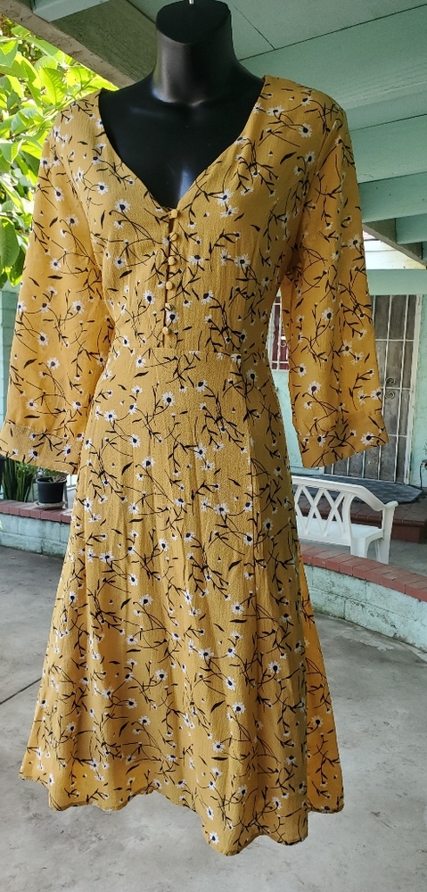 Light mustard secretary dress with white flowers
